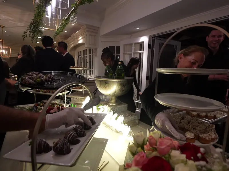 Greenery-draped porch dessert and champagne station at an El Sobrante evening event